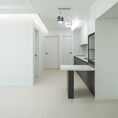 Simple and white interior with door and flooring standing out